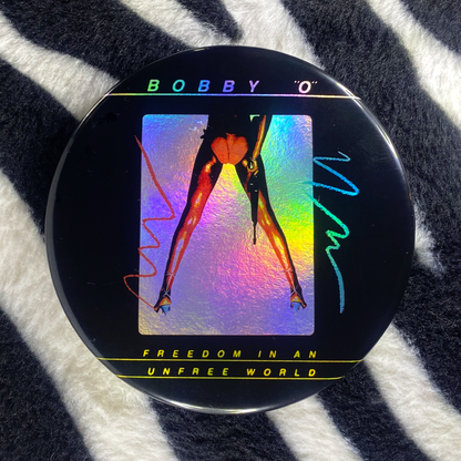 "BOBBY O - FREEDOM IN AN UNFREE WORLD" holographic pinback button