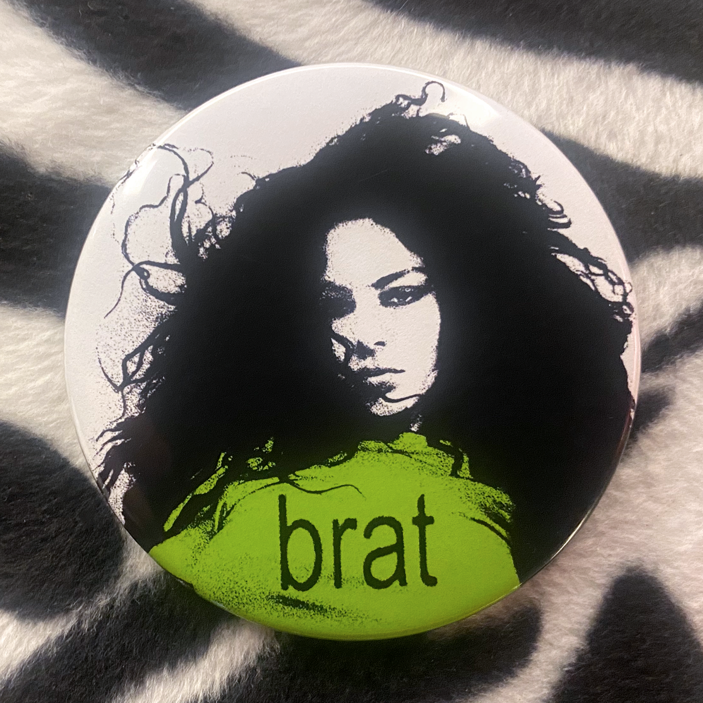 "CHARLI XCX - BRAT" pinback button