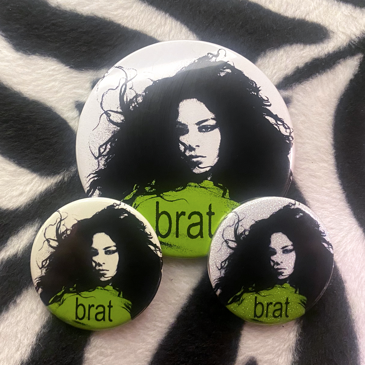 "CHARLI XCX - BRAT" pinback button