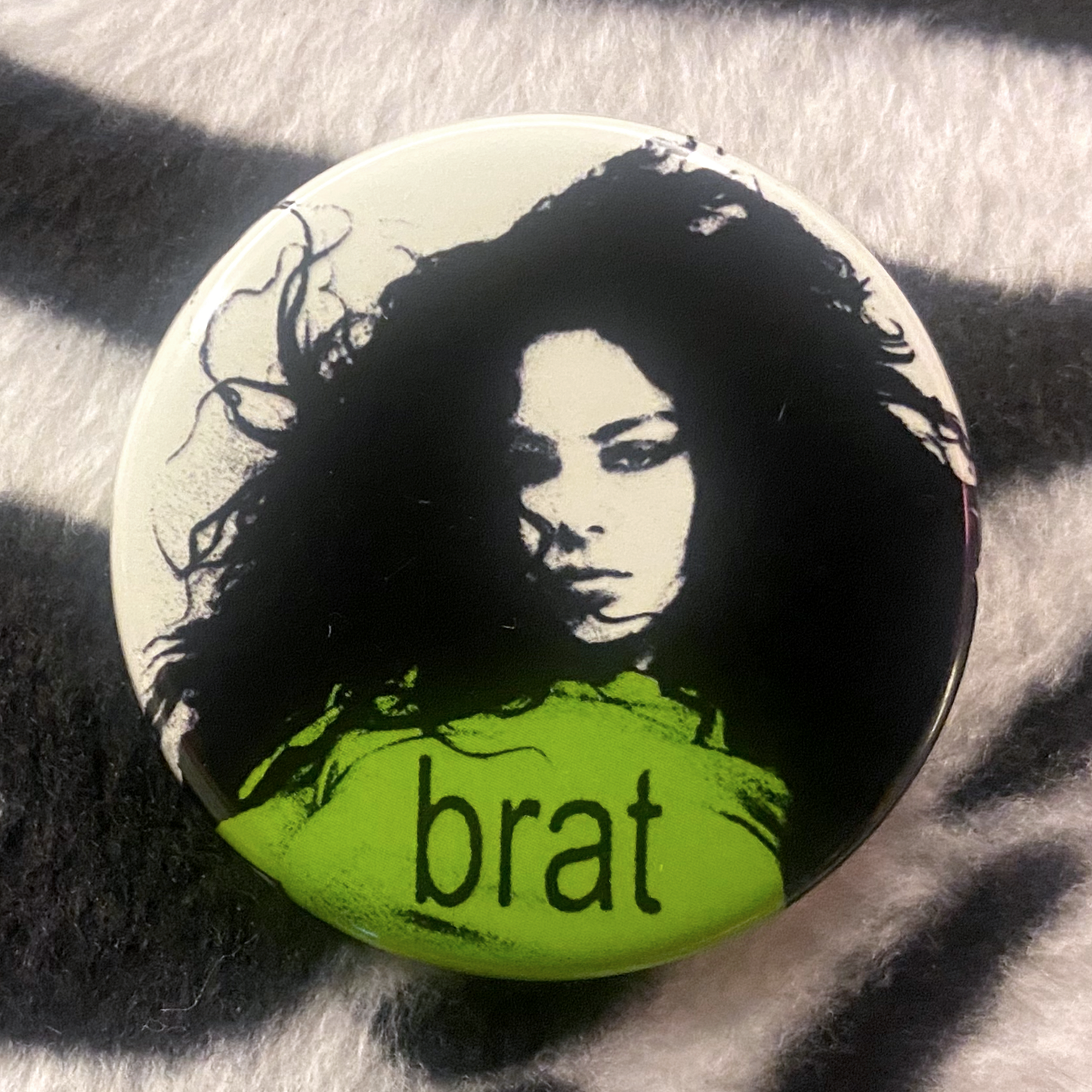 "CHARLI XCX - BRAT" pinback button