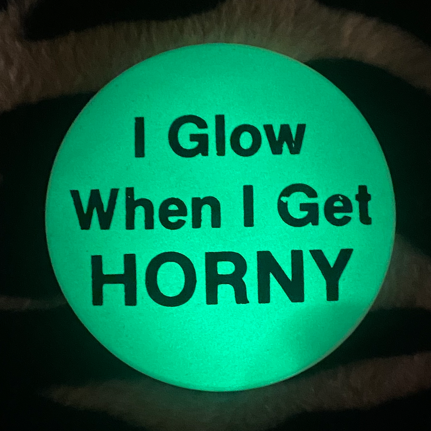 "I GLOW WHEN I GET HORNY" glow in the dark pinback button