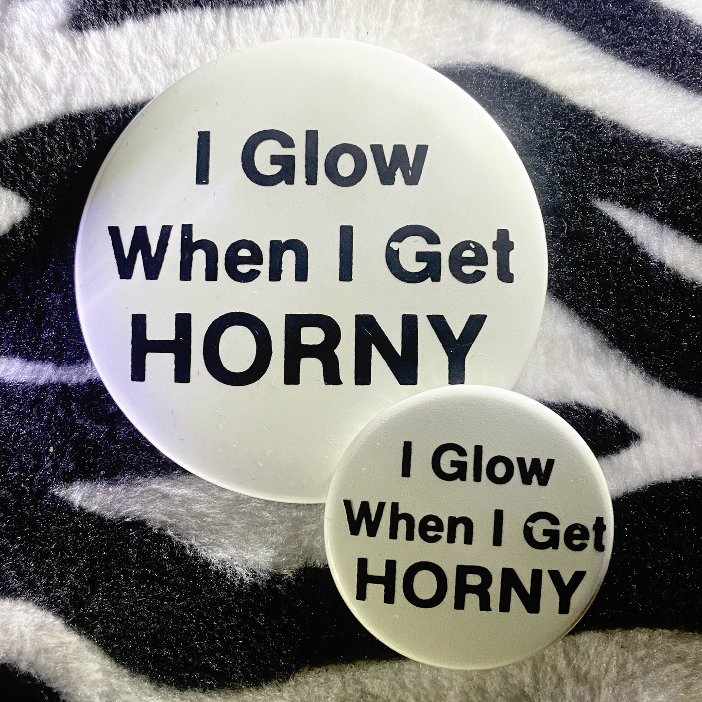 "I GLOW WHEN I GET HORNY" glow in the dark pinback button