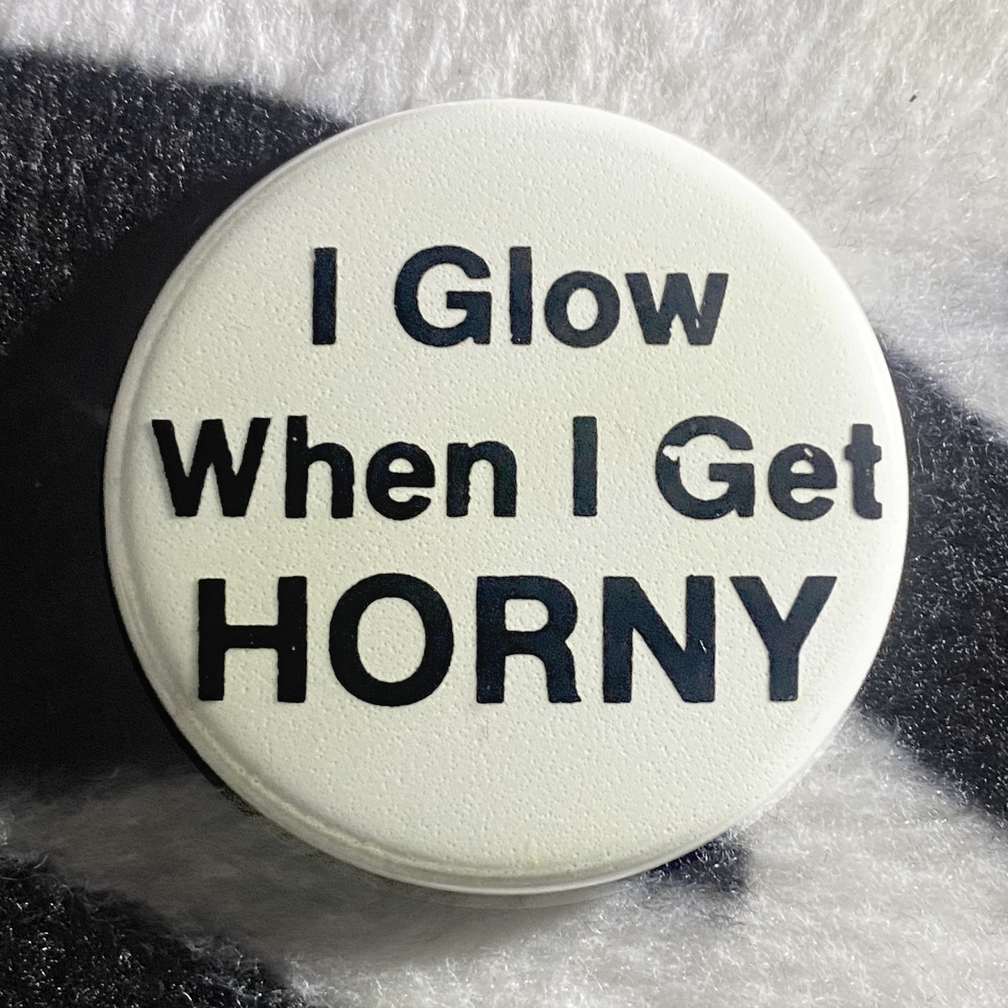 "I GLOW WHEN I GET HORNY" glow in the dark pinback button