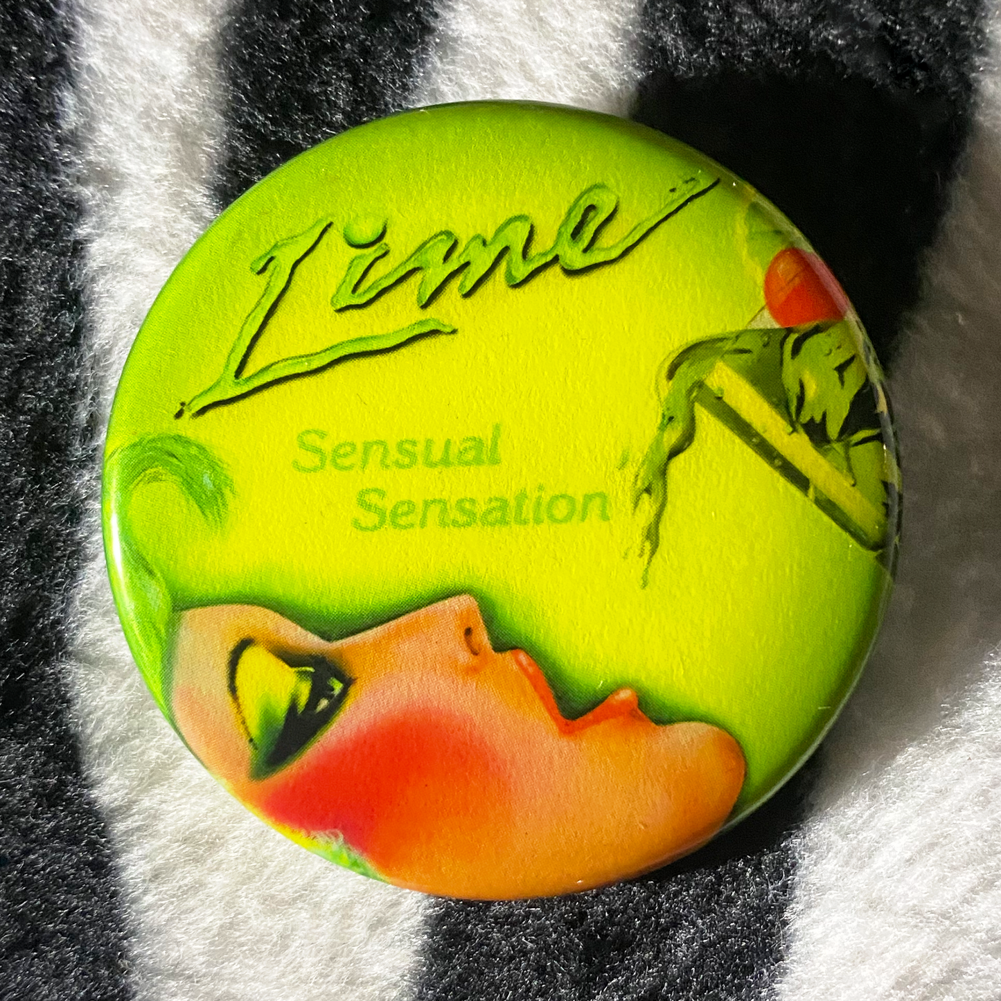 "LIME - SENSUAL SENSATION" pinback button