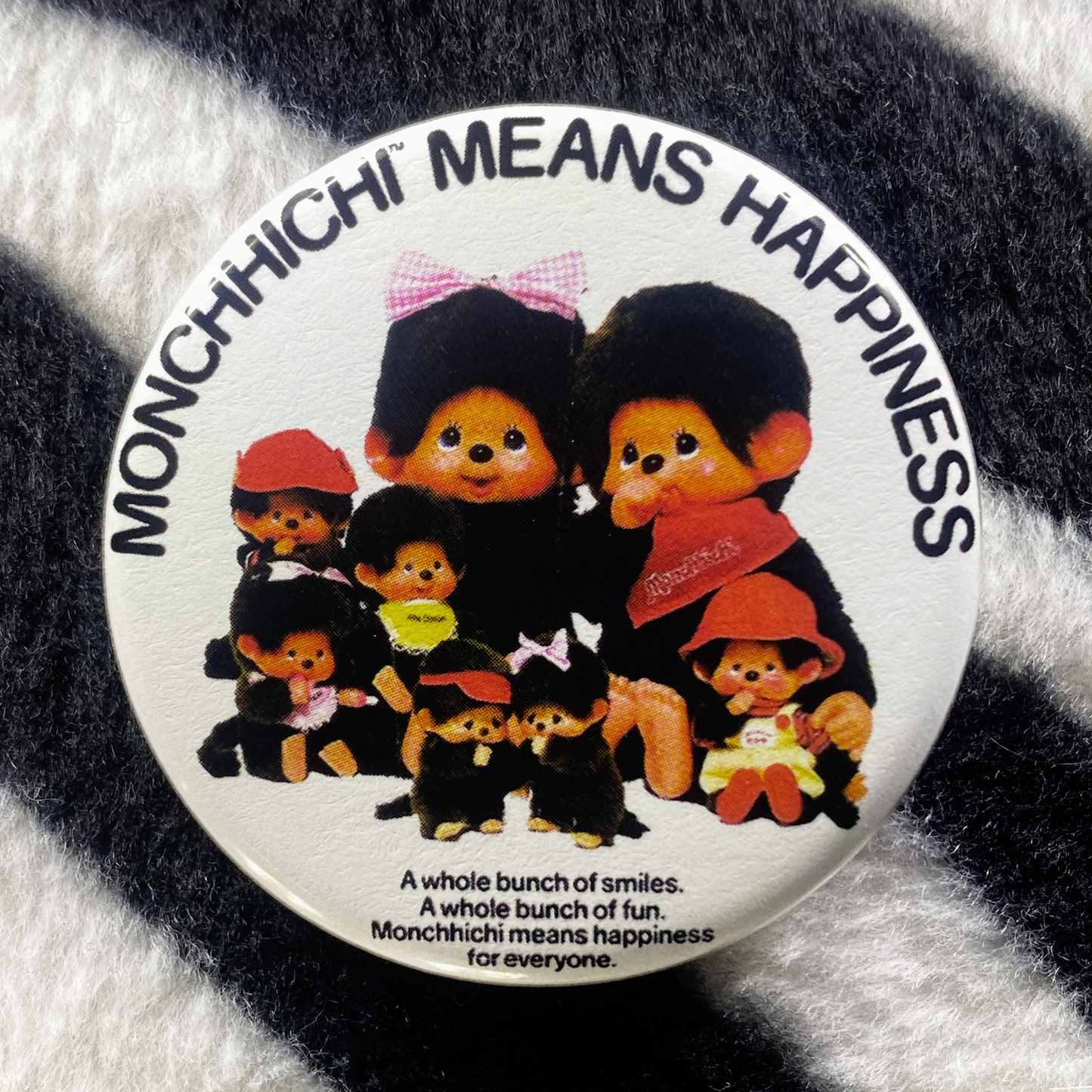 "MONCHHICHI MEANS HAPPINESS" pinback button