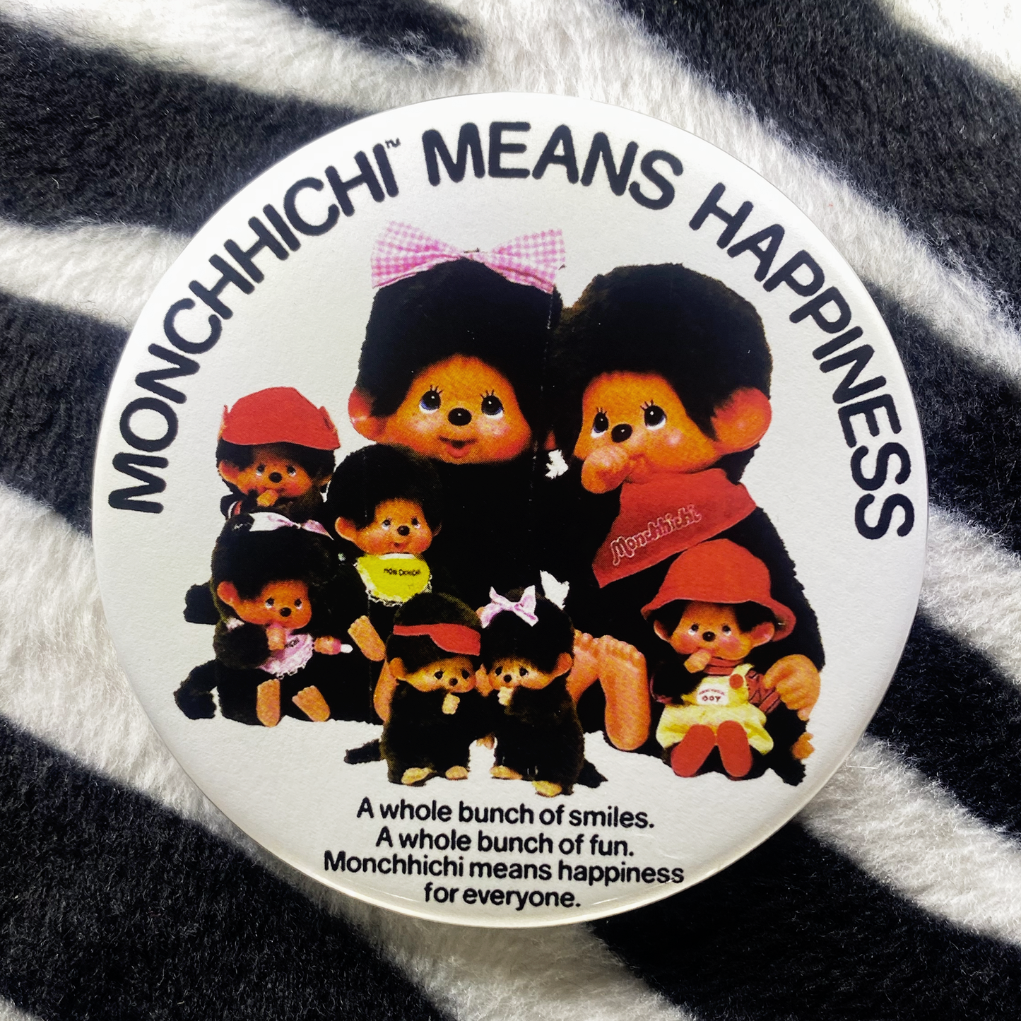 "MONCHHICHI MEANS HAPPINESS" pinback button