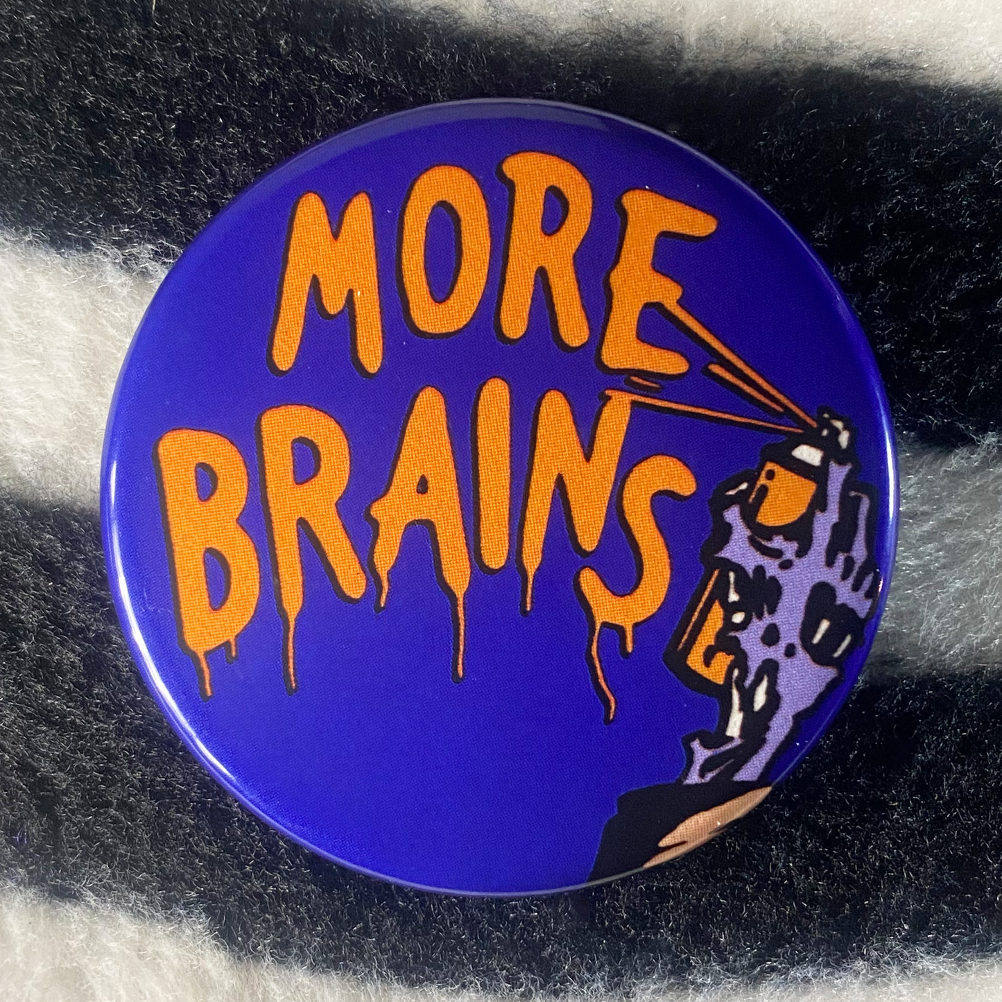 "MORE BRAINS" pinback buttton