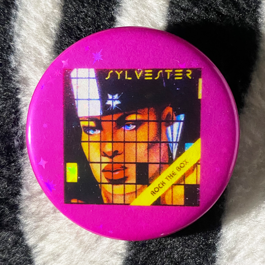 "SYLVESTER - ROCK THE BOX" holographic pinback button