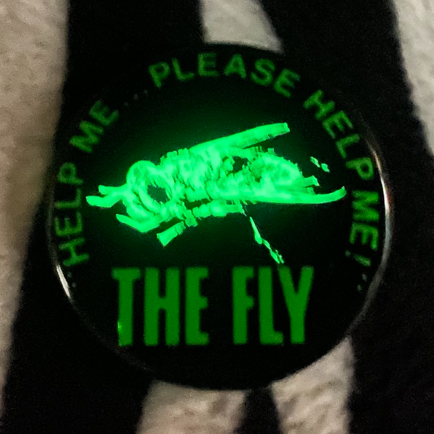 "THE FLY" blacklight pinback button